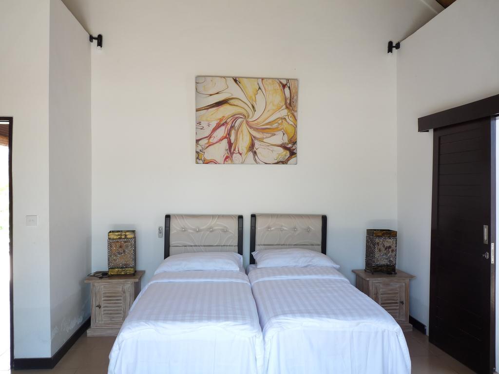 Taman Dewi Sri Villa Et Bungalow Pemuteran Δωμάτιο φωτογραφία
